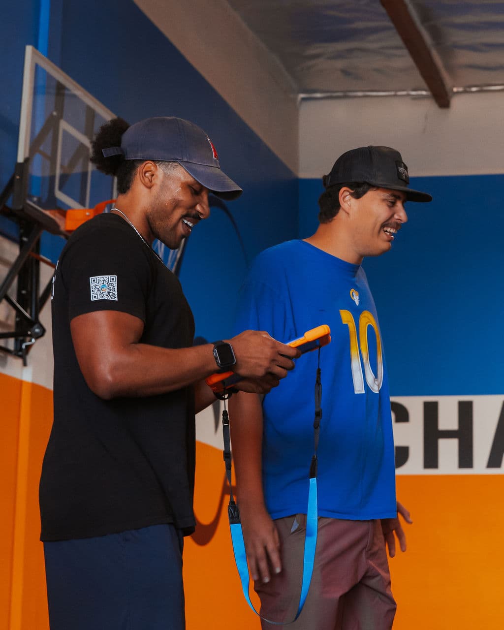 Coach working with athlete on adaptive exercises